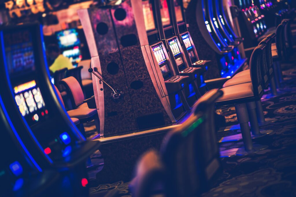 A photo of slot machines in a casino.