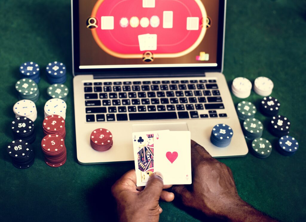 A photo of a person playing poker online.