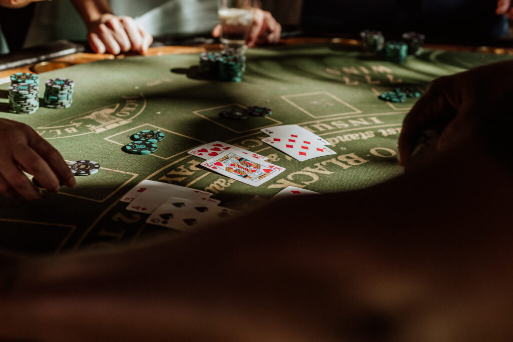 Close up of a blackjack table with a blackjack game in progress at a casino.