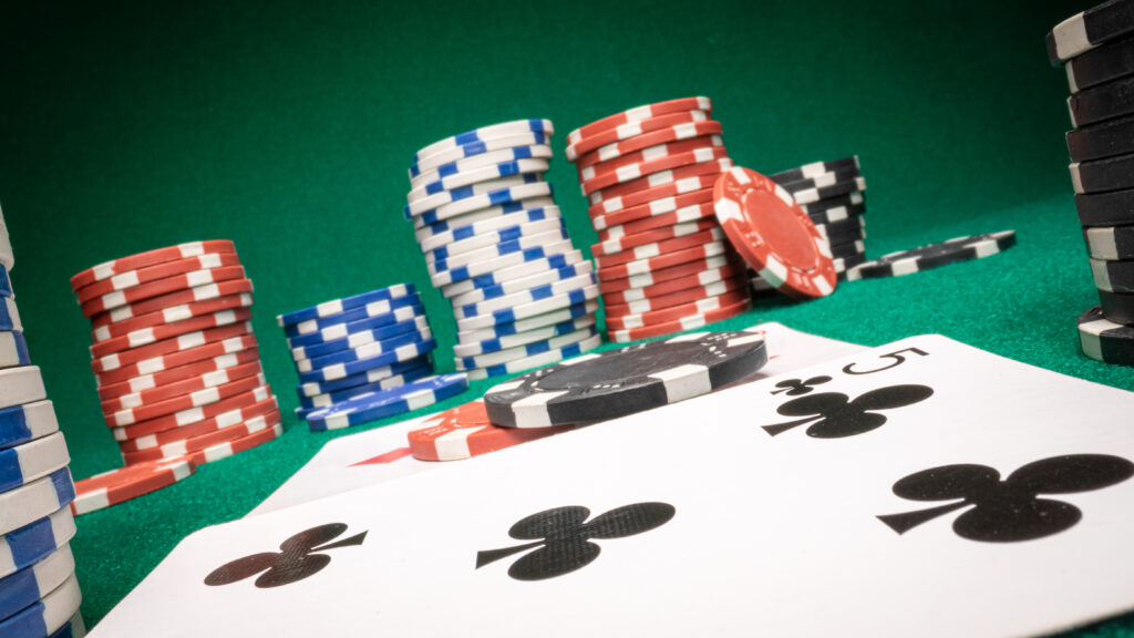 Close up of casino chips and playing cards